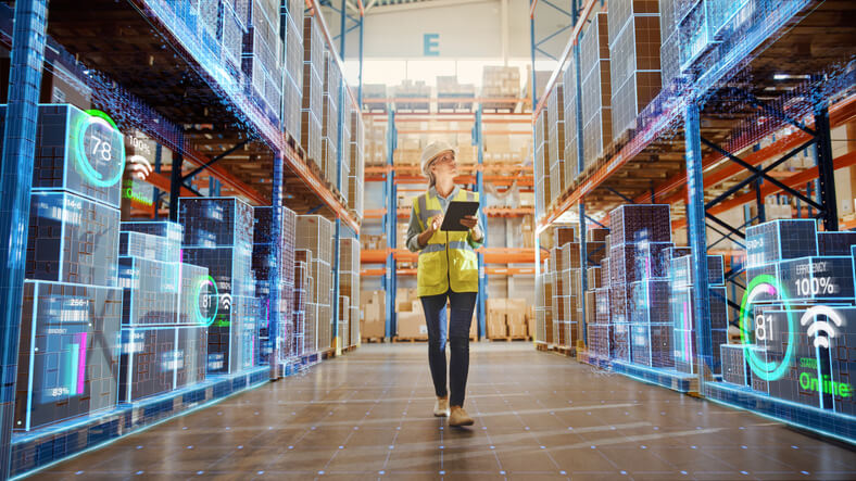 A woman working in Supply Chain Management after logistics courses in a warehouse