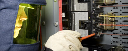 A residential electrician at work after electrician training