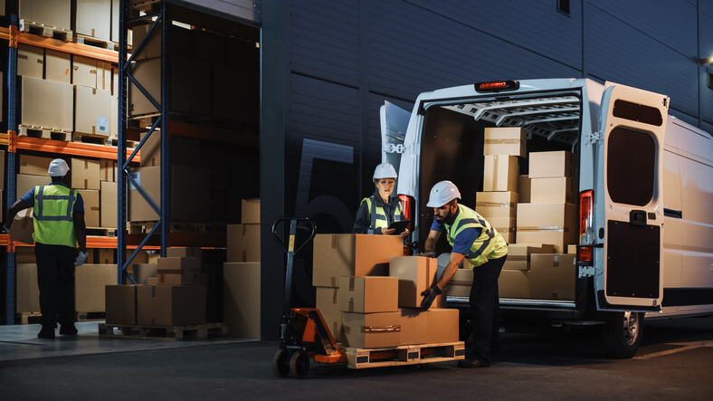 A logistics manager taking care of transport arrangements after logistics training