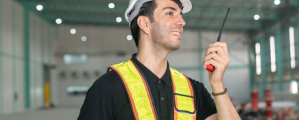A male electrical foreman at a worksite after electrician training