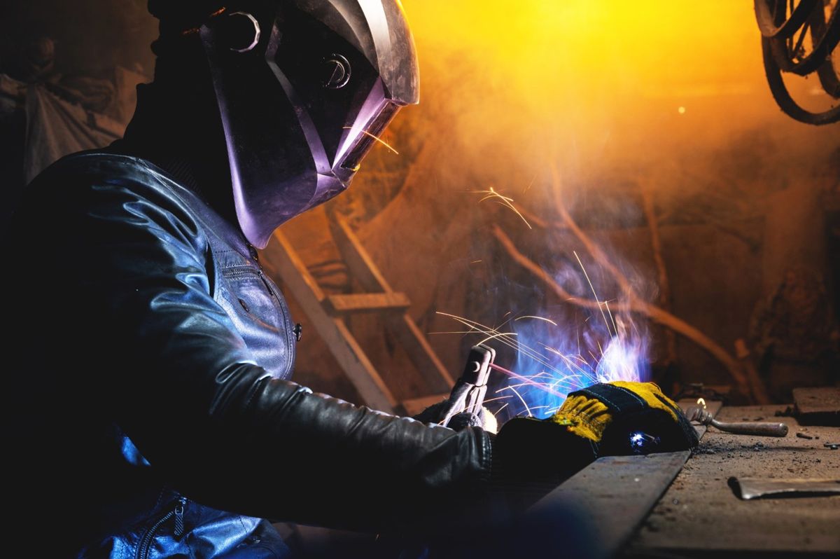 Student practising flux core welding at North American Trade Schools